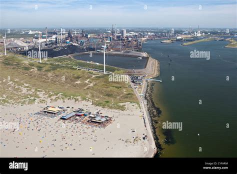 netherlands wijk aan zee people  beach background tata steel company aerial stock