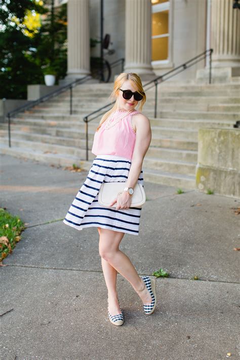pink bow blouse and striped skirt classy sassy