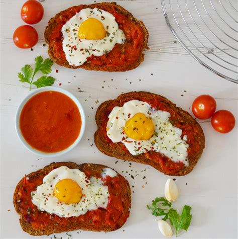 toast with spicy tomato sauce and eggs anne travel foodie