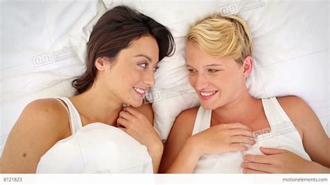 Lesbian Couple Cuddling In Bed Stock Video Footage 8121823