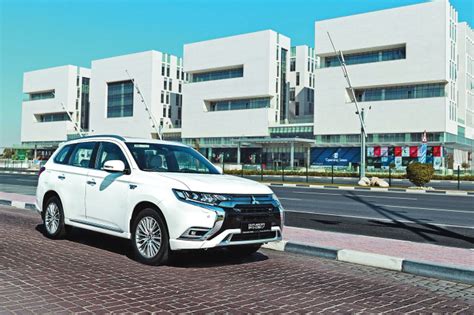 qac introduces new mitsubishi outlander hybrid electric phev in qatar