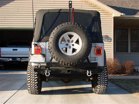 tj rear tire carrier page  jeepforumcom