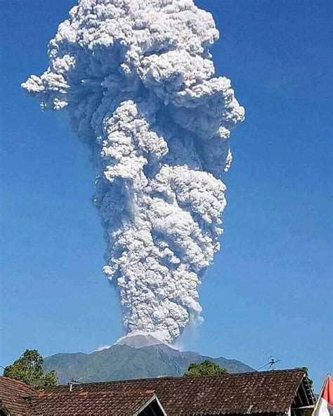 merapi volcano erupts sending plume of ash 11 6 km 38 000 feet above sea level in indonesia