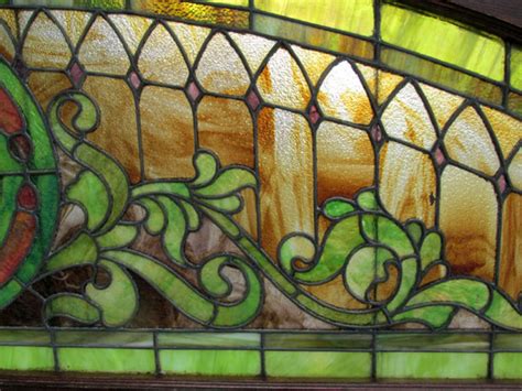 large arched stained glass window wooden nickel antiques