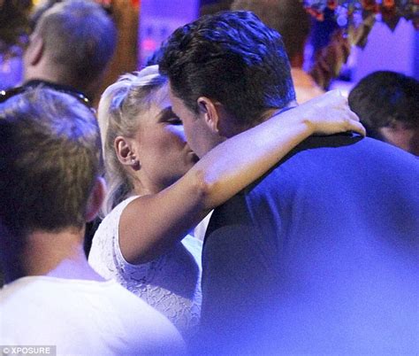 towie s billie faiers squeezes into white playsuit as she kisses