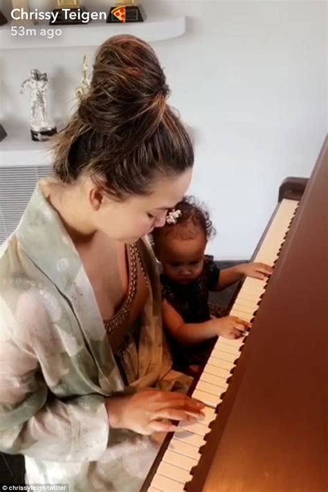 john legend s daughter luna tries her hand on the piano daily mail online