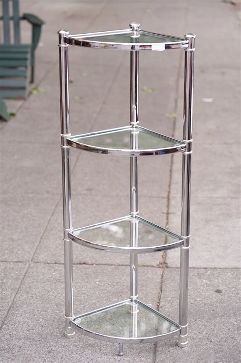 uhuru furniture collectibles sold  modern chrome glass  tall  wide corner shelf