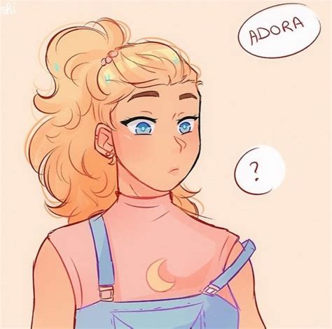 a woman with blonde hair and blue eyes is looking at an adora bubble