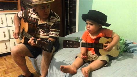 father and son sing i love you with guitar and hats youtube