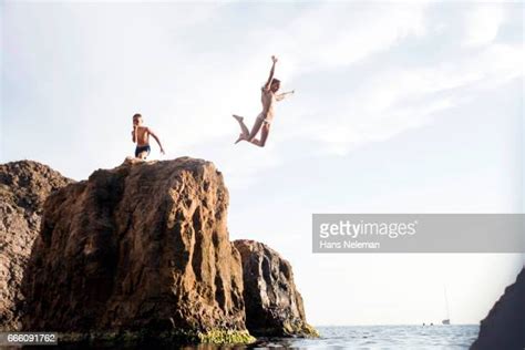 running  cliff   premium high res pictures getty images