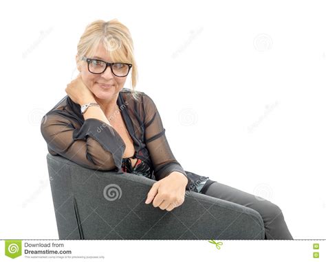 portrait of beautiful mature woman with eyeglasses stock
