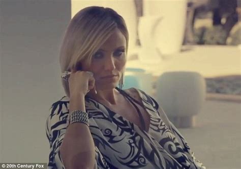 have you been bad cameron diaz shows wild side in trailer for the counselor atop car hood in