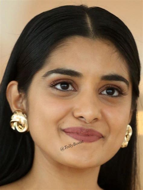 glamorous indian girl niveda thomas long hair face closeup tollywood