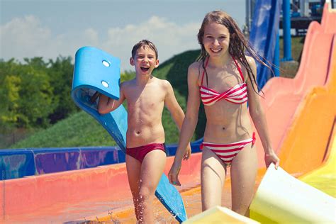 boy  girl  bikini  fun  water park  stocksy contributor jovana milanko stocksy