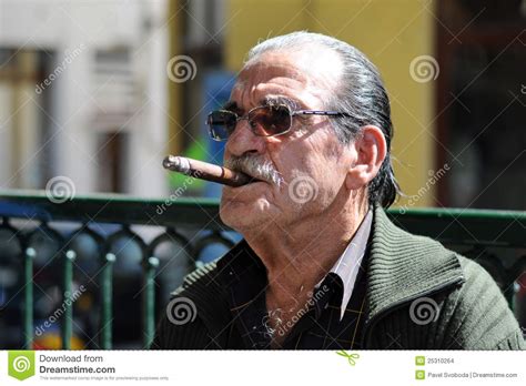 Old Unidentified Man Smoking Cigar Editorial Stock Image