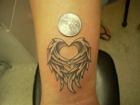 pin  rosie ruiz  tattoos wing tattoos  wrist heart  wings