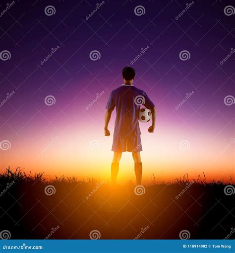 rear view soccer player watching  sunrise stock photo image  posing length