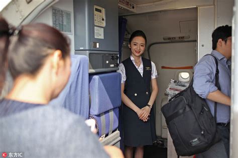 world s most beautiful stewardess serving passengers with