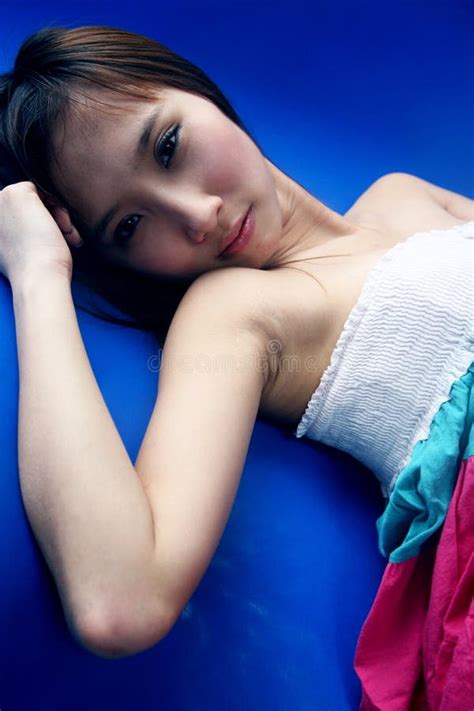 Girl Lying Down In A Colorful Dress Stock Image Image Of Lovely
