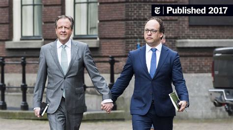 dutch men hold hands in solidarity with attacked gay