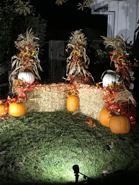 fall front yard decorations hay bales pumpkins corn stalks fall