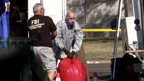 graphic fbi found bucket of heads arms and legs bodies sewn