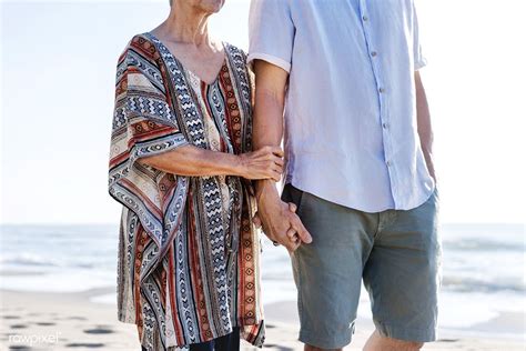 Mature Couple Walking Together At The Beach Premium Image By Rawpixel