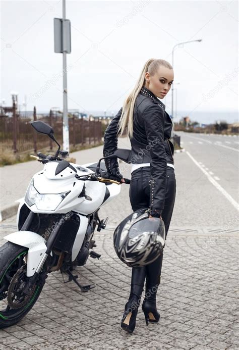 Sexy Girl With Long Blond Hair In Leather Jacket Posing On Motorbike