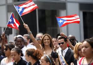 carnival queen jennifer lopez brings the streets of new york to a standstill as she leads puerto