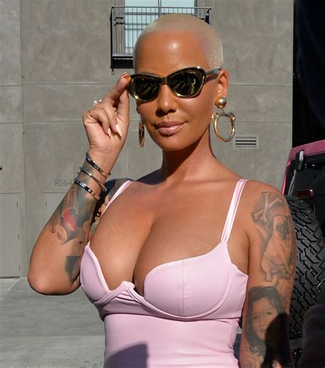 amber rose showing major cleavage at the launch of her