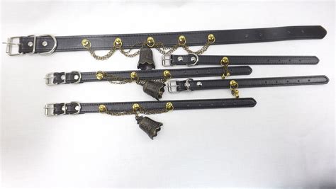 slave collar and cuffs set black leather with large gold