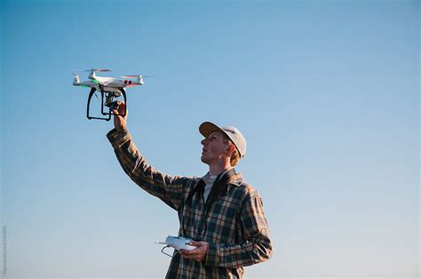 man flying  drone   coast  stocksy contributor kkgas stocksy