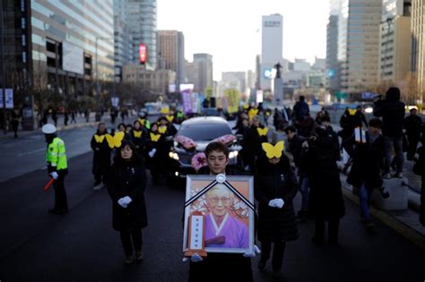 s koreans march with coffin in comfort women protest at