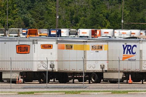 teamsters  trucking giant yellow corp  ceasing operations filing  bankruptcy