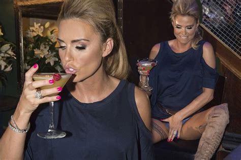 katie price is back pricey flashes her lace thong and necks screaming