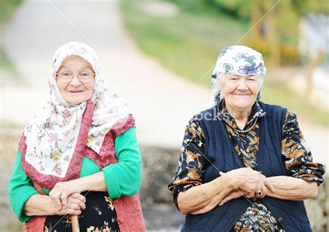 portrait of two very old women outdoor royalty free stock image