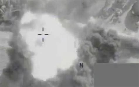 raf drone footage shows  moment  missile stops isil carrying   public execution