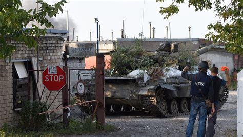 ukraine fends off rebel attack near donetsk airport