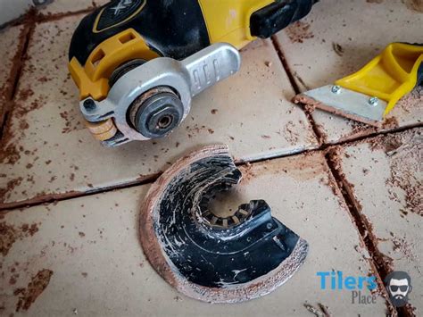 remove grout   oscillating multi tool tilers place