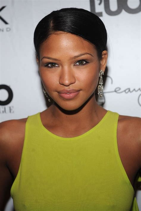 cassie this green dress looks amazing on her dark skin and the earings