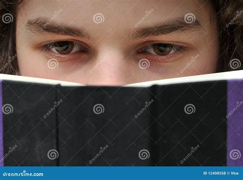 young adult reading book stock photo image  educationeyes