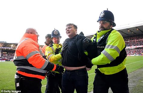 Leicester Fan Arrested After Running On The Pitch To Confront
