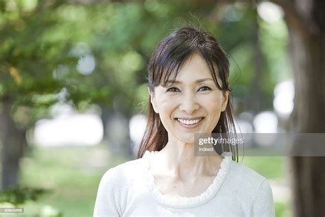 mature woman smiling portrait photo getty images