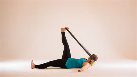 5 new ways to use a yoga strap