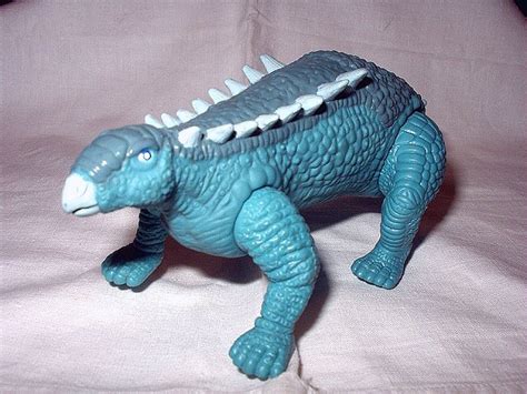 vintage plastic molded dinosaur moveable toy