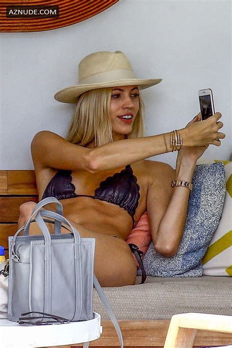 Devon Windsor Hits The Beach To Film For An Unknown