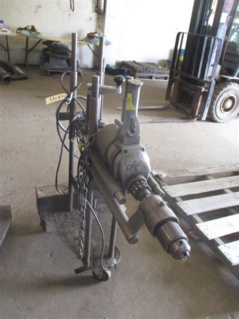 horizontal mobile frame drill unit powered  milwaukee drill