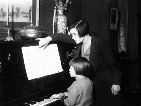 Piano Lesson 1930s A Female Piano Teacher Turns Over The