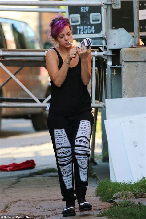 Lily Allen Dresses Down In Tracksuit Bottoms As She Smokes On A Quick