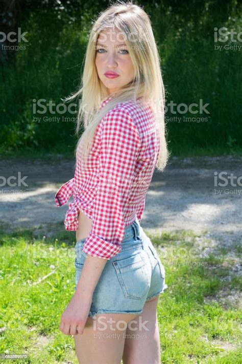 Young Blonde Woman In Park Cute Teenage Girl Outdoors Mild Retouch